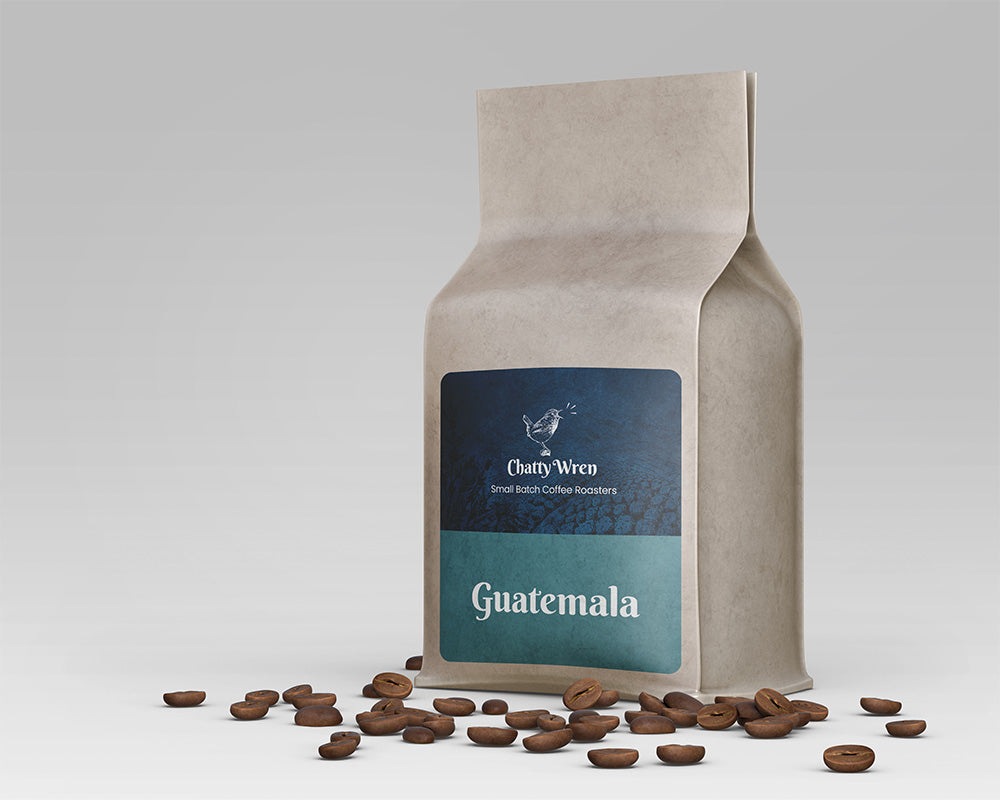 Coffee bag with a teal colored label that reads "Guatemala."