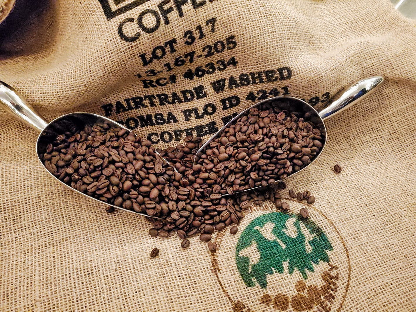 Coffee beans on top of burlap bag