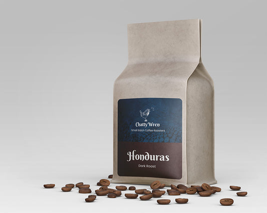 Bag of coffee with a dark brown label that says "Honduras Dark Roast"